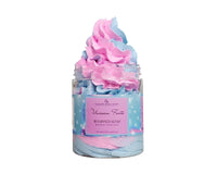 Jar of whipped soap with pink and blue colors on a white background