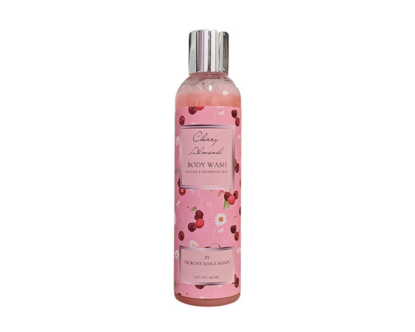 Body wash bottle with cherry design on a white background