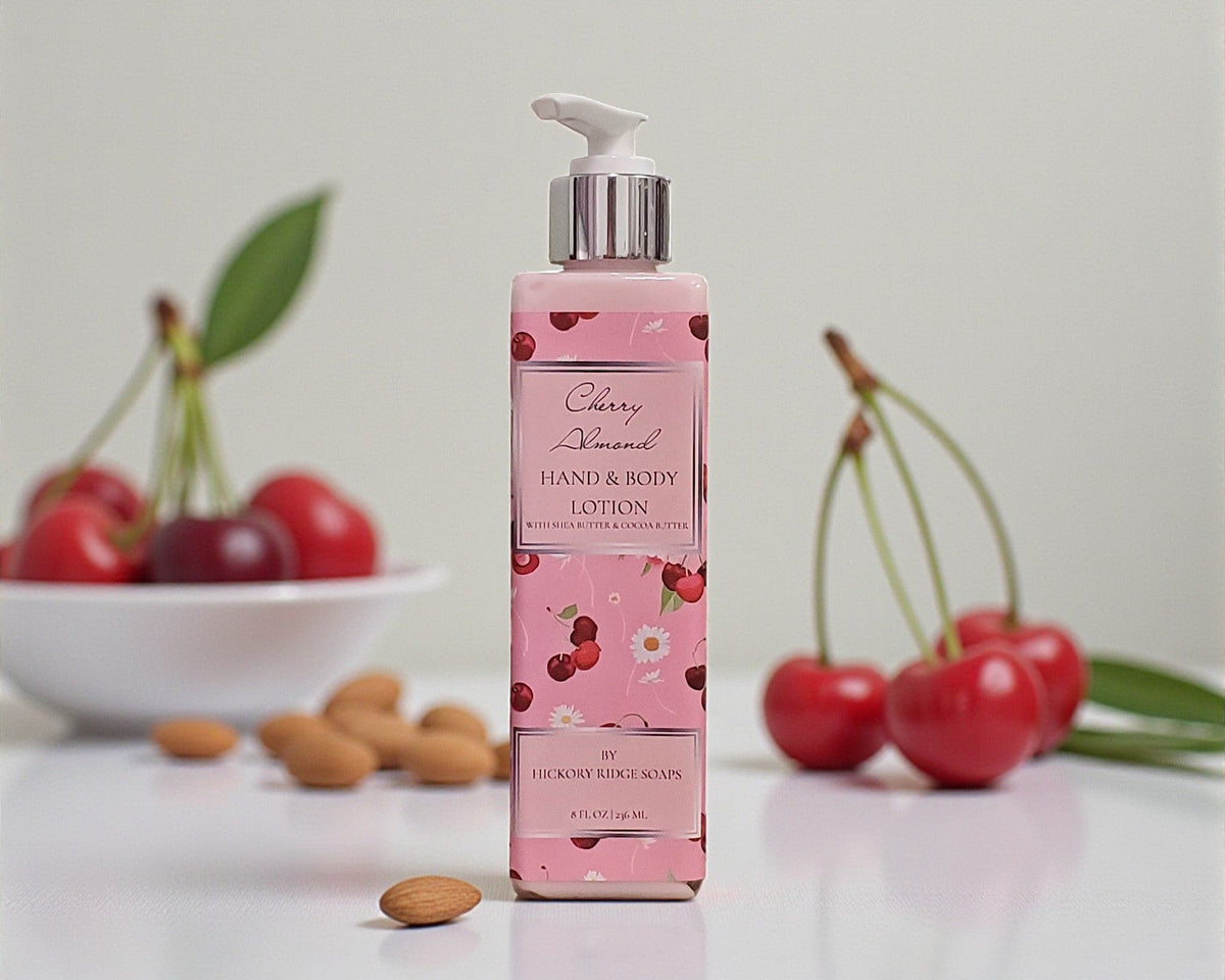 Cherry Almond hand and body lotion with cherries and almonds in the background