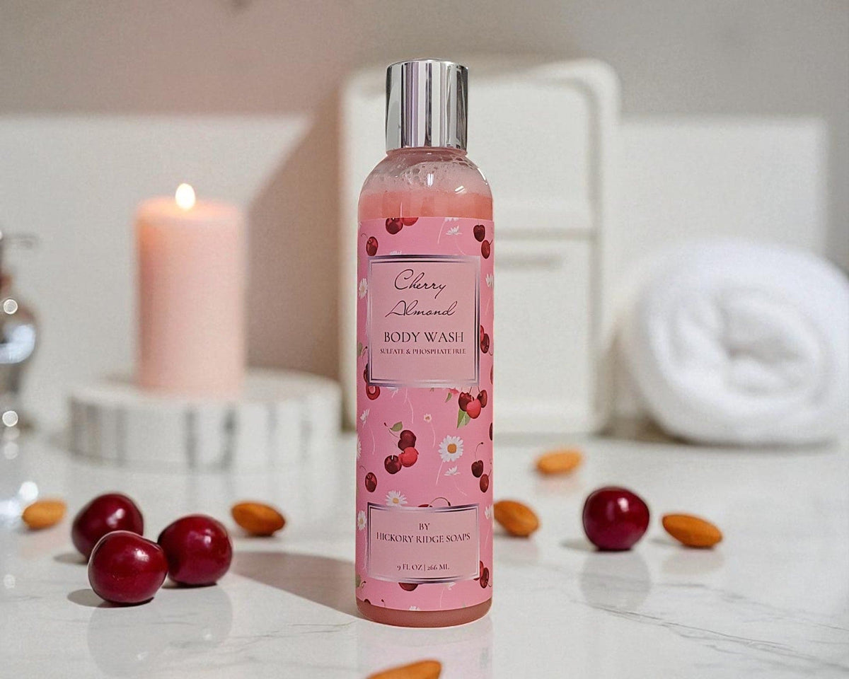 Pink body wash bottle with cherry design on a bathroom counter.