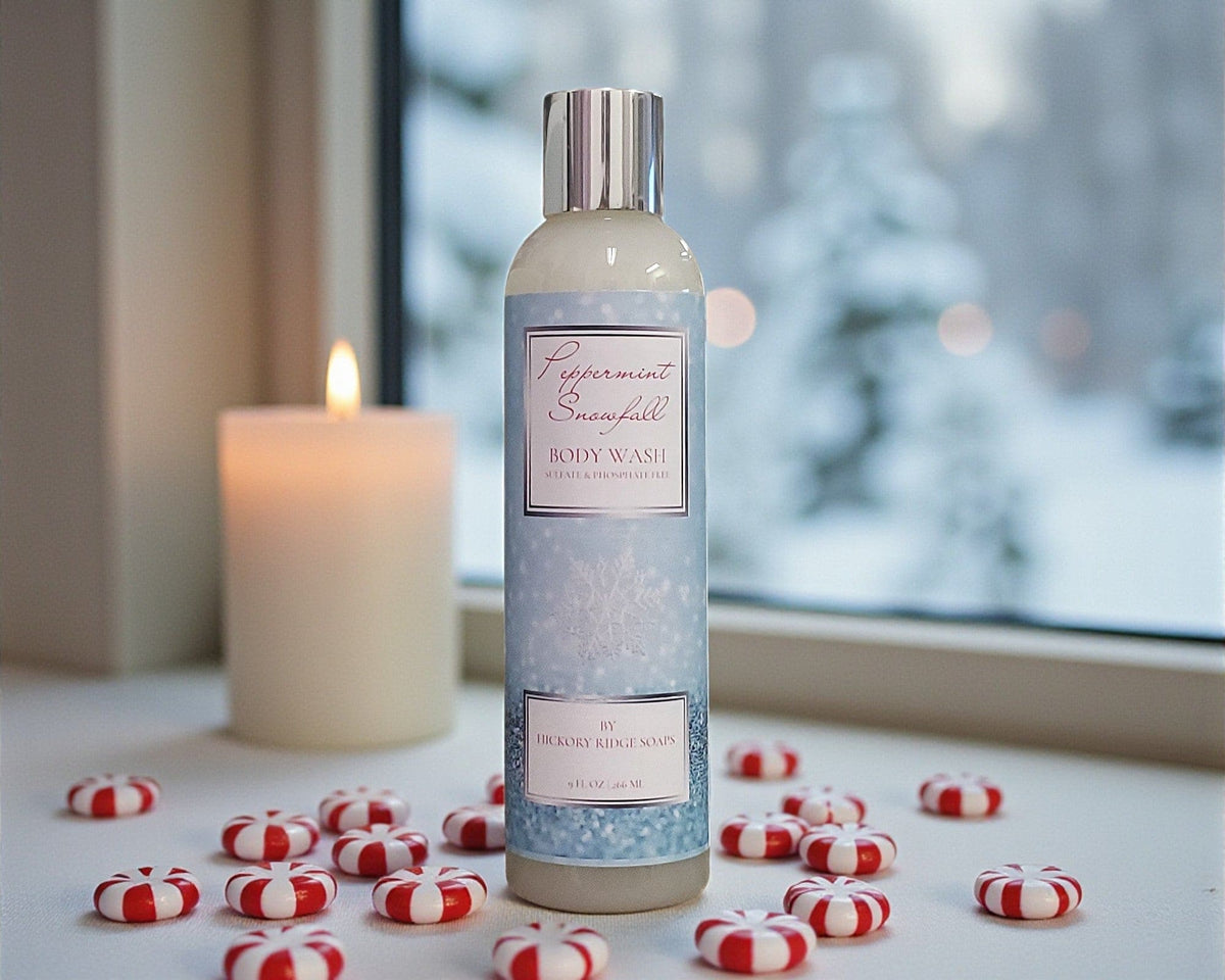 Body wash bottle with peppermint candy on a surface near a window with snow outside