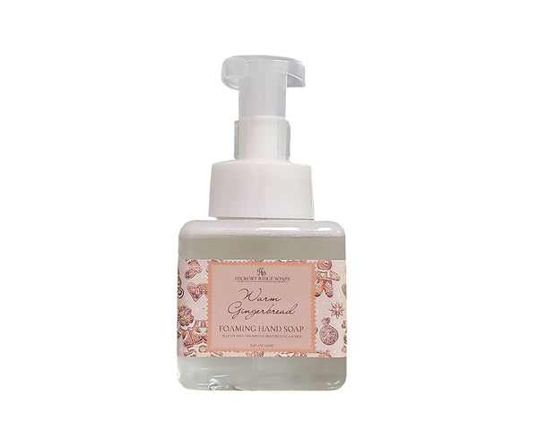 Foaming hand soap bottle with pump on a white background