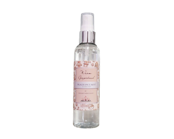 Fragrance mist bottle with gingerbread design on a white background